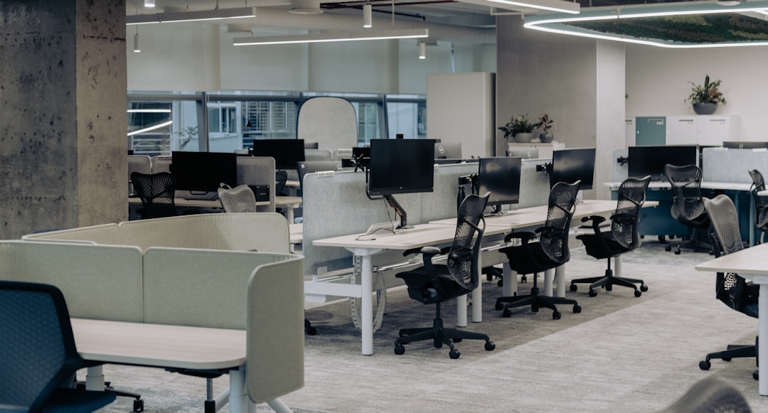 Modern office with desks and ergonomic chairs